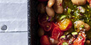 Tomato,bean and chicken tray bake with mint pesto.