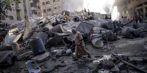 The aftermath or a retaliatory Israeli air strike on Gaza City.