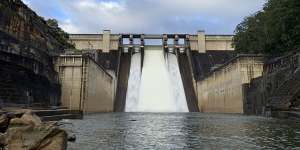 Warragamba Dam tips over capacity on Sunday morning.