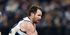 Skipper Patrick Dangerfield bursts clear for Geelong against Essendon;a game where the Cats looked like men playing against boys.