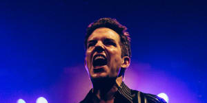 Rock’n’roll preacher man:Brandon Flowers leading The Killers at Rod Laver Arena in Melbourne on December 13.
