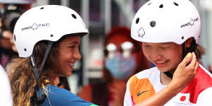 Rayssa Leal of Brazil,13,greets Momiji Nishiya. also 13,during the women’s street skateboard final in Tokyo.