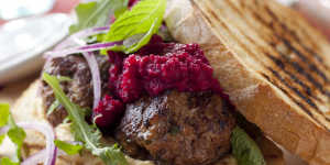 Meatball sandwich with hummus and beetroot.