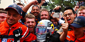 Sergio Perez celebrates with his Red Bull teammates after winning the Monaco Grand Prix on Sunday.