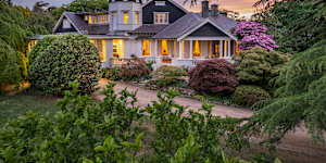 The historic main house at Milton Park is surrounded by English-style gardens dating to the early 20th century.