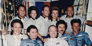 US and Russian crews including Mike Foale,front right,beside cosmonaut Alexander Lazutkin,and Russian commander Vasily Tsibliyev,front second from left.