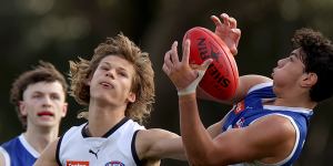 Tall defender Cooper Trembath (right) is among the mid-season draft contenders.