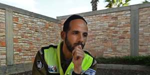 Search and rescue volunteer Israel Revach at the Ofakim cemetery recounts how he helped identify bodies killed in the Hamas attack. 