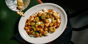 Lebanese garlic dumplings with poached leeks,spiced chicken and pine nuts.