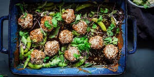 Quick sticky sesame lemongrass pork meatball traybake. Summer traybake recipes and sheetpan dinners for Good Food,January 2020. Images and recipes by KatrinaÃÂ Meynink. Good Food use only. One tray wonders.