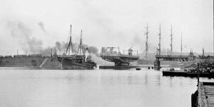 History:A steam vessel leads the four-masted German barque Gustav through the open Glebe Island bridge.
