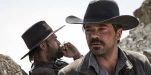 Dominic Cooper and Douglas Booth in spaghetti western-inspired That Dirty Black Bag.