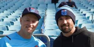 Blues coach Michael Maguire and Socceroos player Mat Ryan at NSW training on Tuesday.