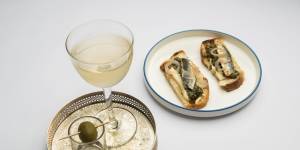 Sardines on toast and smoked olive martinis are available from brunch to dinner. 