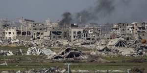 Smoke rises over Gaza as seen from a position on the Israeli side of the border in Southern Israel,Israel. 