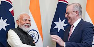 India’s Prime Minister Narendra Modi shakes hands with Anthony Albanese in Melbourne on Thursday.