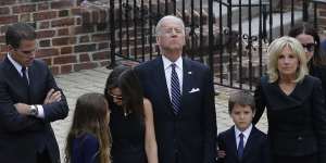 Joe Biden with family before entering a vigil for his son,former Delaware attorney-general Beau Biden,who died of brain cancer aged 46 in 2015.