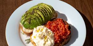 Avocado (and tahini) on toast comes with an extra slice topped with tomato pulp and stracciatella cheese.