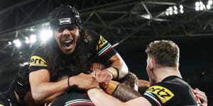 The Panthers celebrate a Brian To’o try.