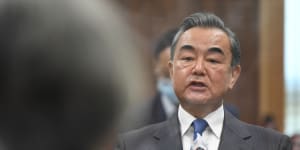 "I would kick the ball to Australia":China's foreign minister Wang Yi says the two nations can improve their relationship. 