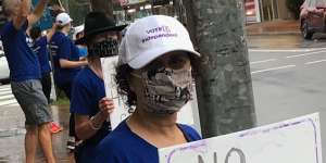 Larissa Penn’s supporters campaign outside Gladys Berejiklian’s office.
