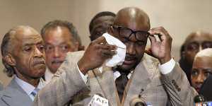 George Floyd’s brother Philonise Floyd wipes his eyes during a news conference after the verdict.