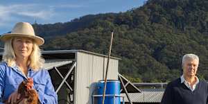 Kristen McLennan at her free-range chicken farm in Kangaroo Valley with filmmaker Ian Darling,whose documentary on silence and solitude a rural community will premiere at the Sydney Film Festival in June.