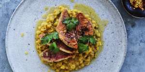 Spices fried in hot oil add an extra layer of flavour to the red mullet and yellow dal.