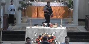 Teen gunman disrupts Catholic mass