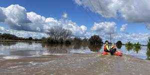 Life Saving Victoria volunteers evacuate people from flooded areas in northern Victoria in October.