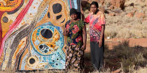 Pauline Wangin,Betty Campbell and Emma Singer,also at Mimili,with their work for the NGA’s Ngura Pulka exhibition.