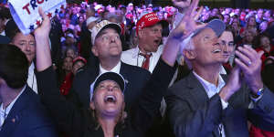 Supporters erupt in cheers at the Trump election party in Florida.