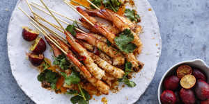 Prawn skewers with lemon myrtle butter and blood limes (right).