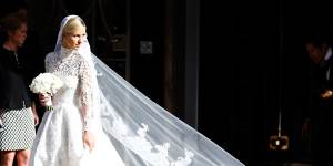 Nicky Hilton in her $100,000 Valentino lace wedding dress that mimicked the style of royal brides Kate Middleton and Grace Kelly.
