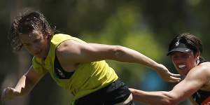 Jack Briskey (left) in action during a Collingwood training session earlier this year. He could be added to their list. 