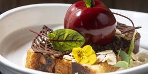 Brunch dishes include a brioche French toast with biscuit leaves topped with a chocolate cherry filled with cream and cherry compote.