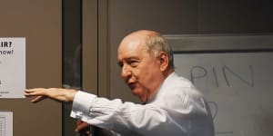 Alan Jones on air on Tuesday morning and then reviewing letters in his office. 