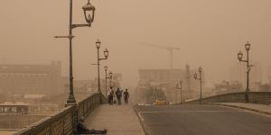 A dust storm in central Baghdad. Now nearly 40 per cent of Iraq has been overtaken by blowing desert sands that claim another 10,000 hectares every year. 