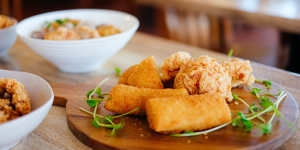 Indonesian risoles:soft crepes filled with a chicken ragaout that are breaded and fried.