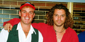 Shane Warne with Michael Hutchence,lead singer of INXS in England in 1993.