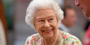 Queen Elizabeth II,back in public duty in person at G7,was all smiles. 