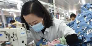 China’s manufacturing activity continues to grow but at a slower pace.