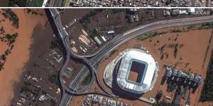 Before and after views of flooding of areas around Gremio Arena,Porto Alegre,Brazil,on Tuesday.