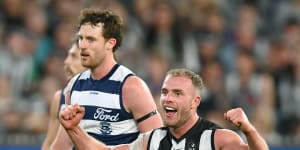 New Magpie Tom Mitchell celebrates a goal against Geelong.