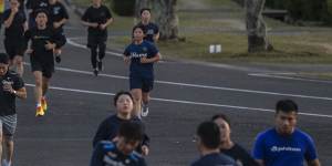 Members of the Japan Self-defence Forces during physical training at the Japan Maritime Self-defence Force headquarters in Sasebo,Japan.