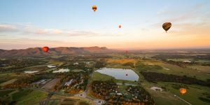 2X0M2WY Hot air Balloons in Pokolbin wine region over wineries and vineyards,Aerial image,Hunter Valley,NSW,Australia**SINGLE USE FOR SMH** Photo:Alamy** Fees apply 