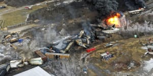 taken with a drone shows portions of a Norfolk Southern freight train that derailed Friday night in East Palestine,Ohio are still on fire the day after the derailment.
