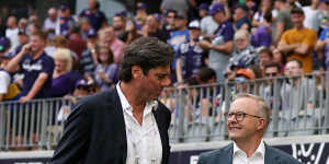 Outgoing AFL chief Gillon McLachlan and Anthony Albanese at a match between Fremantle and West Coast in Perth in April,a month before the league backed the Voice. 