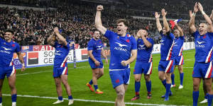 France celebrate after defeating New Zealand.