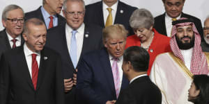 The G20 summit in Osaka is a humbling moment for most of the leaders of the world's biggest economies,looking to just two of them to make the biggest decisions.